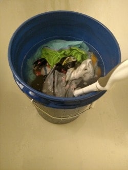 best way to wash clothes for survival