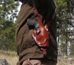 leather holster with thumb strap snap 