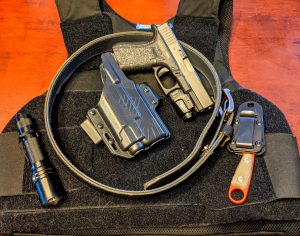 IWB holster carry method with gun belt and cover garment