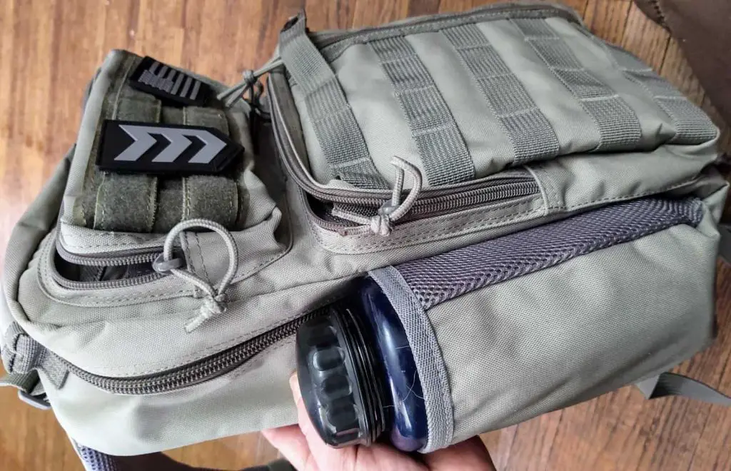 Water bottle holder on the Outlaw Sling pack by 3v gear