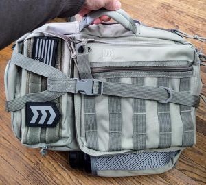 Outlaw sling pack side handle