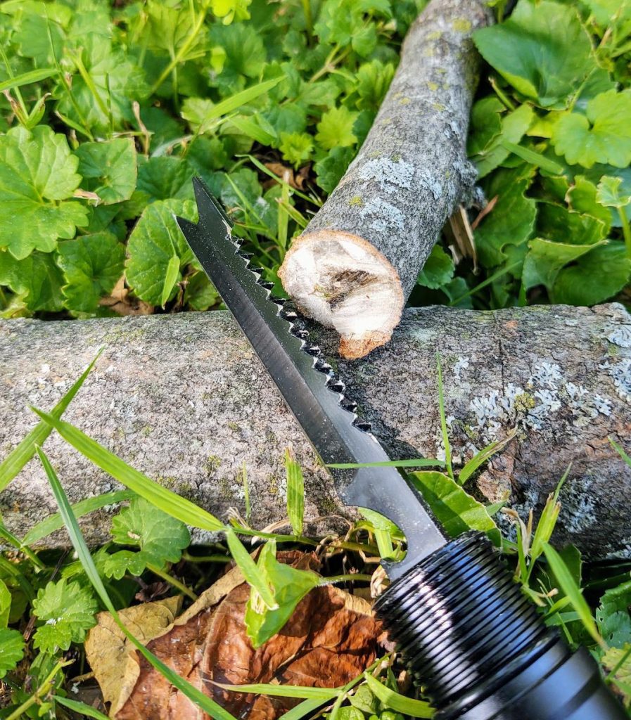 Mini saw, spear point, knife blade, bottle opener 