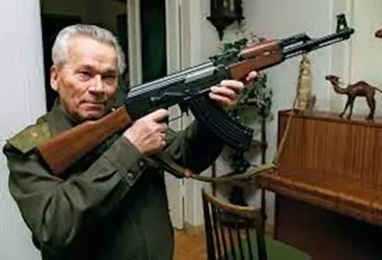 Mikhail Malashnikov with a model of the AK-47 