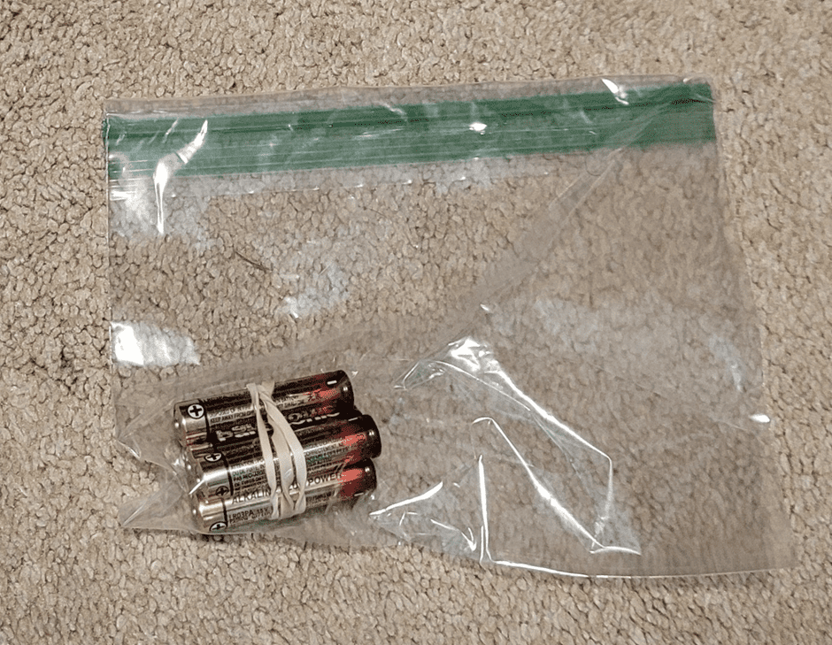Plastic bags storing alkaline batteries