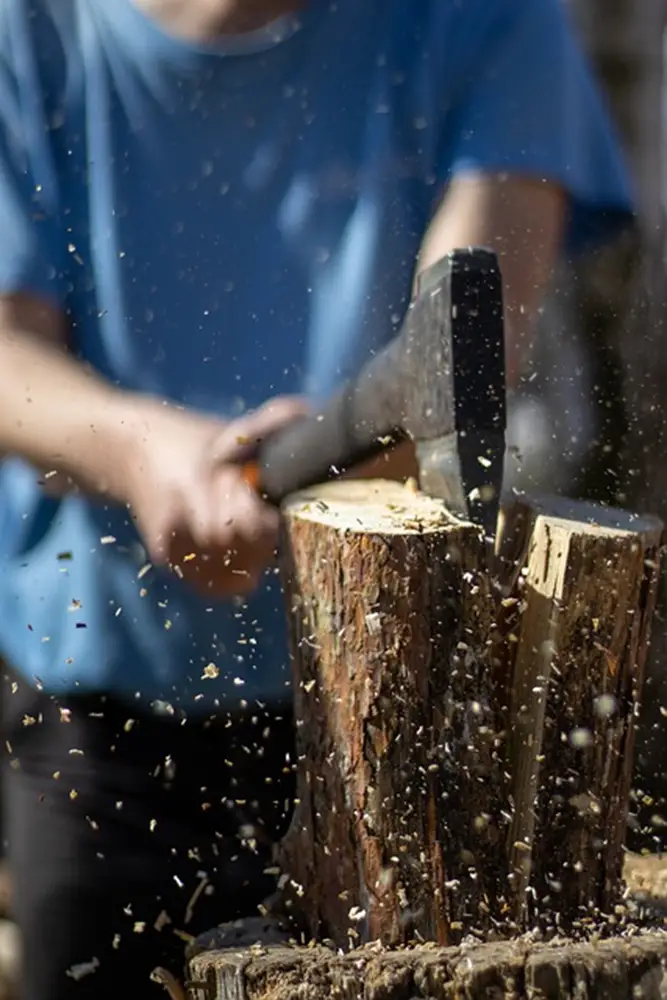 chopping wood with survival axes