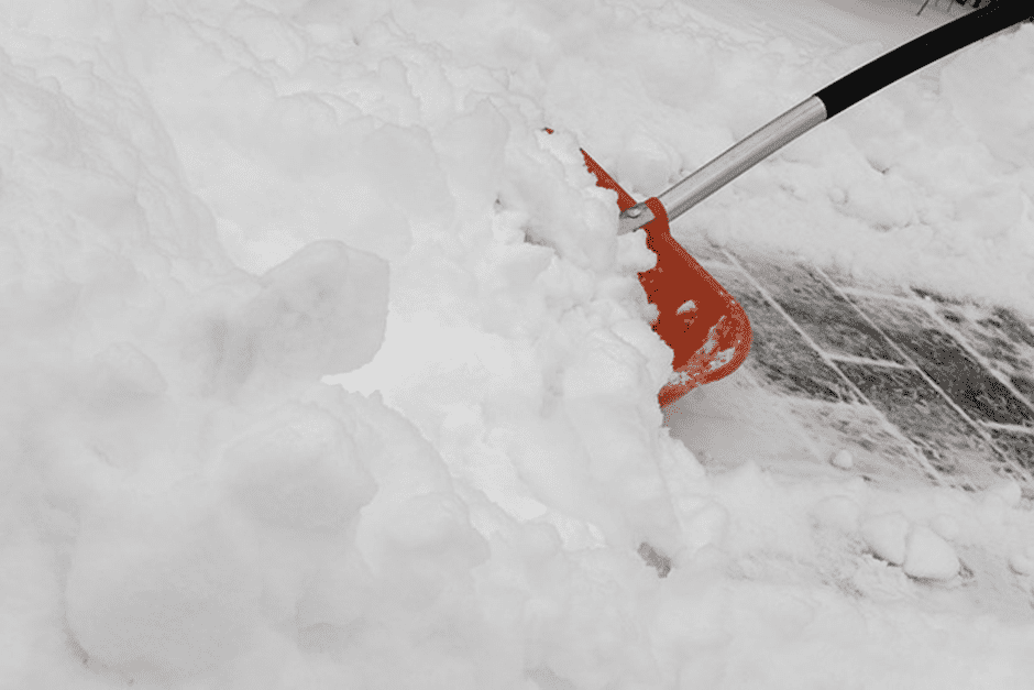 A snow shovel is typically long with a wide and deep head for collecting snow. 